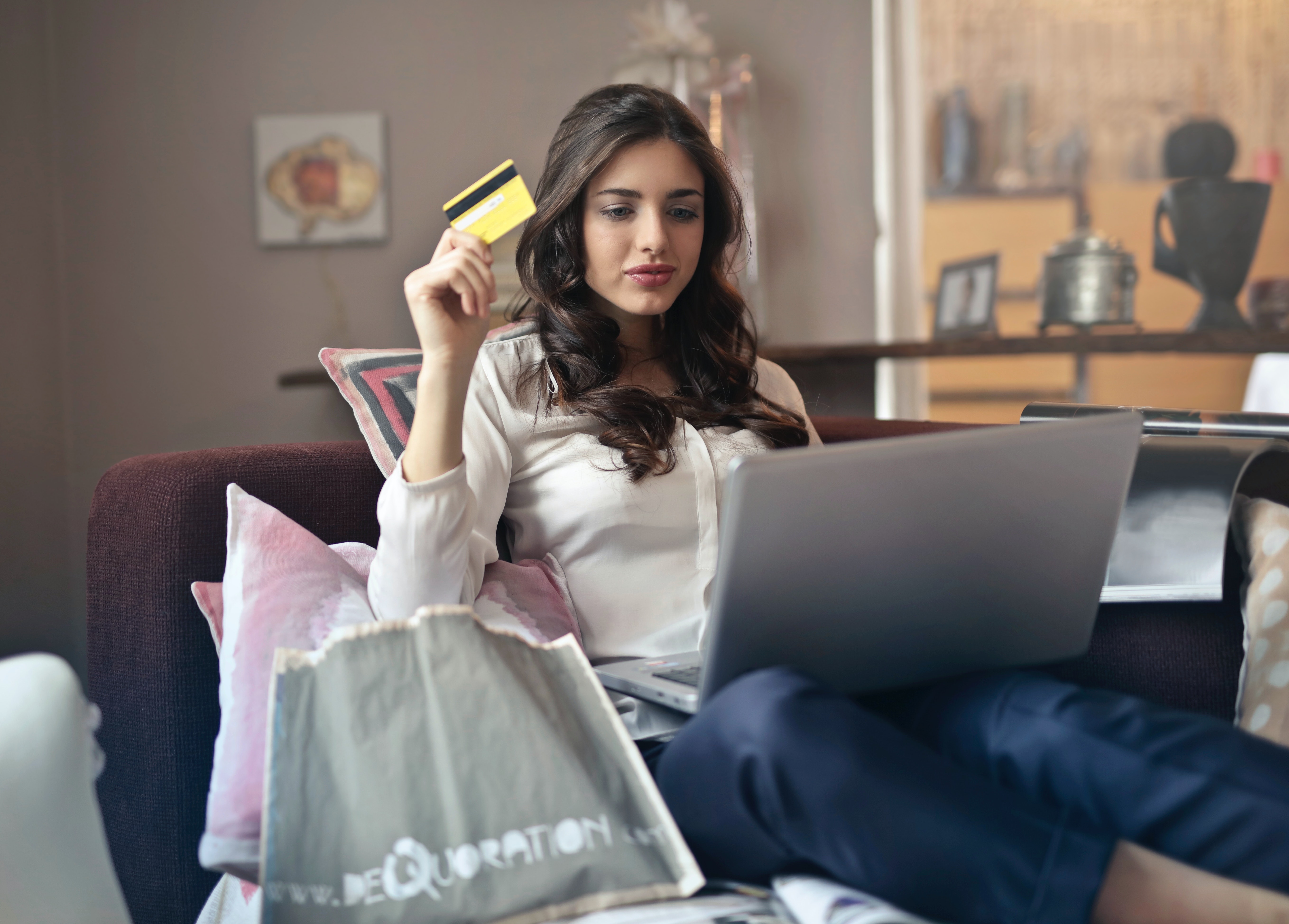 Woman buying stuff online via Google Shopping